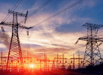 Electrical substation silhouette on the dramatic sunset background